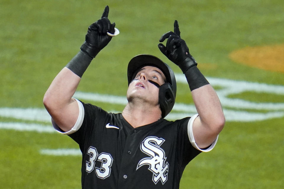 FILE - In this Sept. 9, 2020, file photo, Chicago White Sox's James McCann (33) celebrates as he crosses home plate after hitting a solo home run off Pittsburgh Pirates starting pitcher JT Brubaker during the third inning of a baseball game in Pittsburgh. Free agent catcher James McCann and the New York Mets were close to completing a $40 million, four-year contract Saturday, Dec. 12, 2020, as the team continues to upgrade its roster under new owner Steve Cohen. A person close to the deal confirmed the details to The Associated Press under condition of anonymity because there was no official announcement. (AP Photo/Gene J. Puskar, File)
