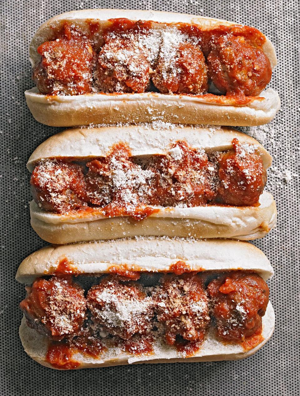 Hollowing out the tops of the hoagie buns keeps the sauce from oozing out the sides (though have napkins nearby in case that happens anyway!).