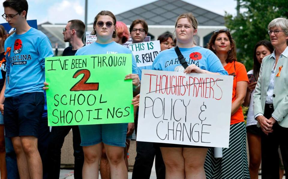 UNC freshmen Danielle Kennedy, left, and Amy Hyde attend a protest against gun violence sponsored by March for Our Lives UNC-CH outside the NC Legislative building in Raleigh, N.C., Tuesday, Sept. 12, 2023.