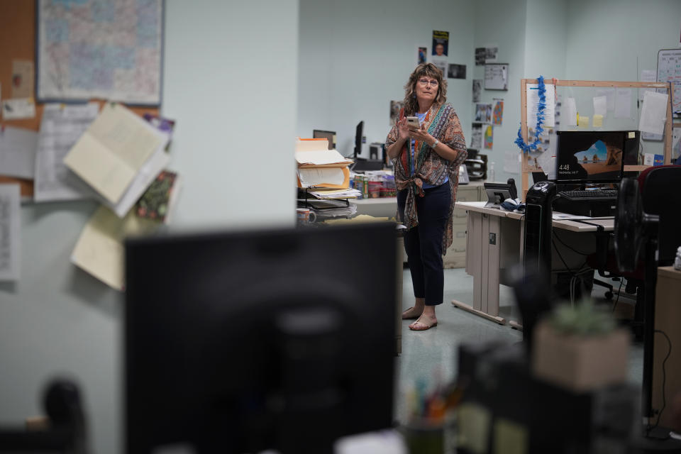 Donna Sybert, Managing Editor of the Butler Eagle newspaper, looks over the newsroom, Wednesday, July 17, 2024, in Butler, Pa. (AP Photo/Matt Slocum)