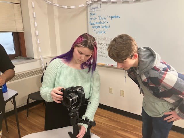 Davenport Central junior Fox Dobbins (right) works with fellow junior and director of photography Rebecca Patrick (photo by Jonathan Turner).