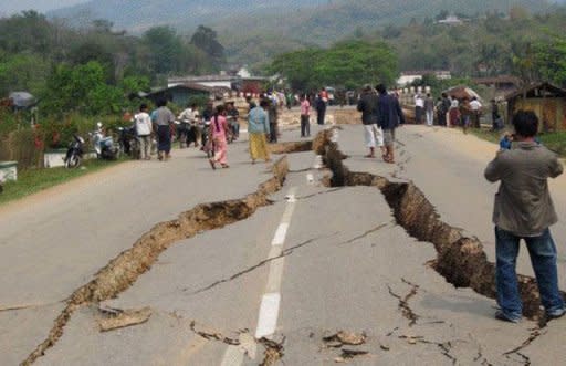 A picture taken close to Myanmar's northeastern city of Tachilek and released by the charity World Vision shows large cracks running along a road a day after an earthquake struck the area. At least 75 people were killed and hundreds left homeless on Friday after a strong earthquake hit Myanmar, as aid workers said it could be days before the extent of the damage becomes clear