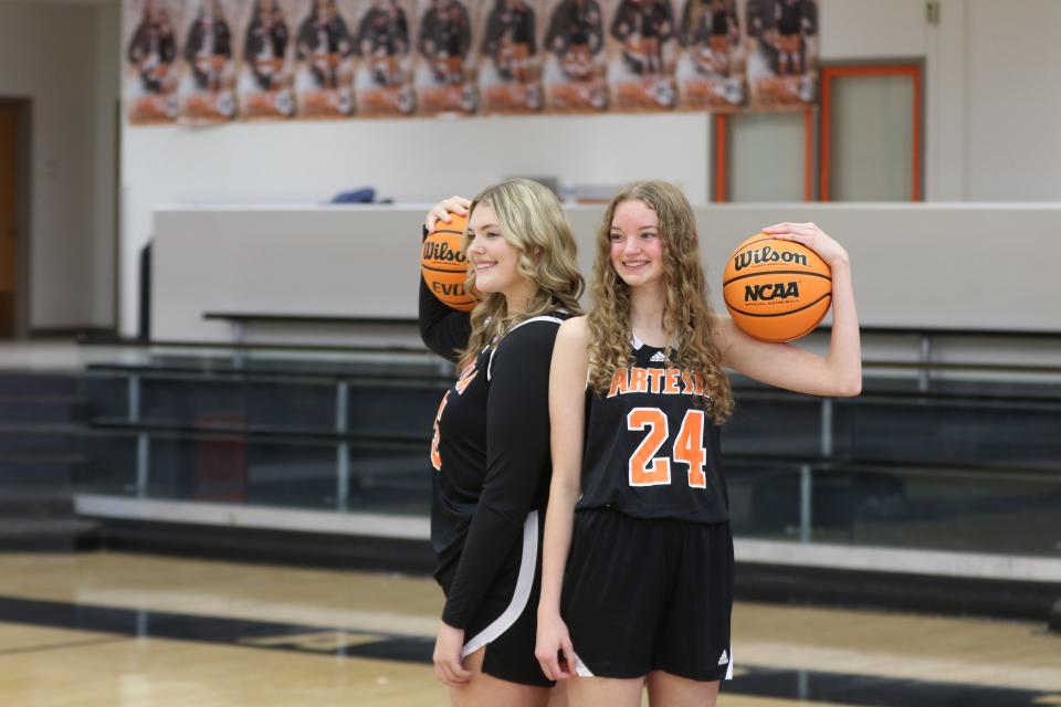 Artesia's Lorin Wagner (left) and Abigail Hauschild (right) pose during media day on Oct. 14, 2023 at the Bulldog Pit in Artesia.