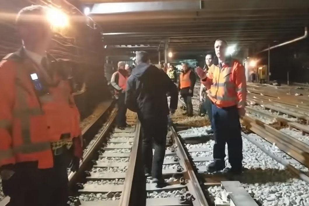 Evacuated: Customers were led off a District Line train after it stopped outside Earl's Court station: YouTube/Max Warren