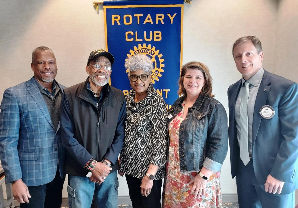 Fred Glenn (second from left), president of the Baltimore Village School, Inc. Board of Directors, told Belmont Rotarians recently about efforts to preserve and restore the historic one-room school building attended by African American students in Cramerton until the 1950s. With him, from left, are board vice president John Howard, board member, and Fred's wife, Ernestine Glenn, board secretary Wendy Cauthen and Rotarian Alex Price of Edward Jones Investments in Belmont, who arranged the program.