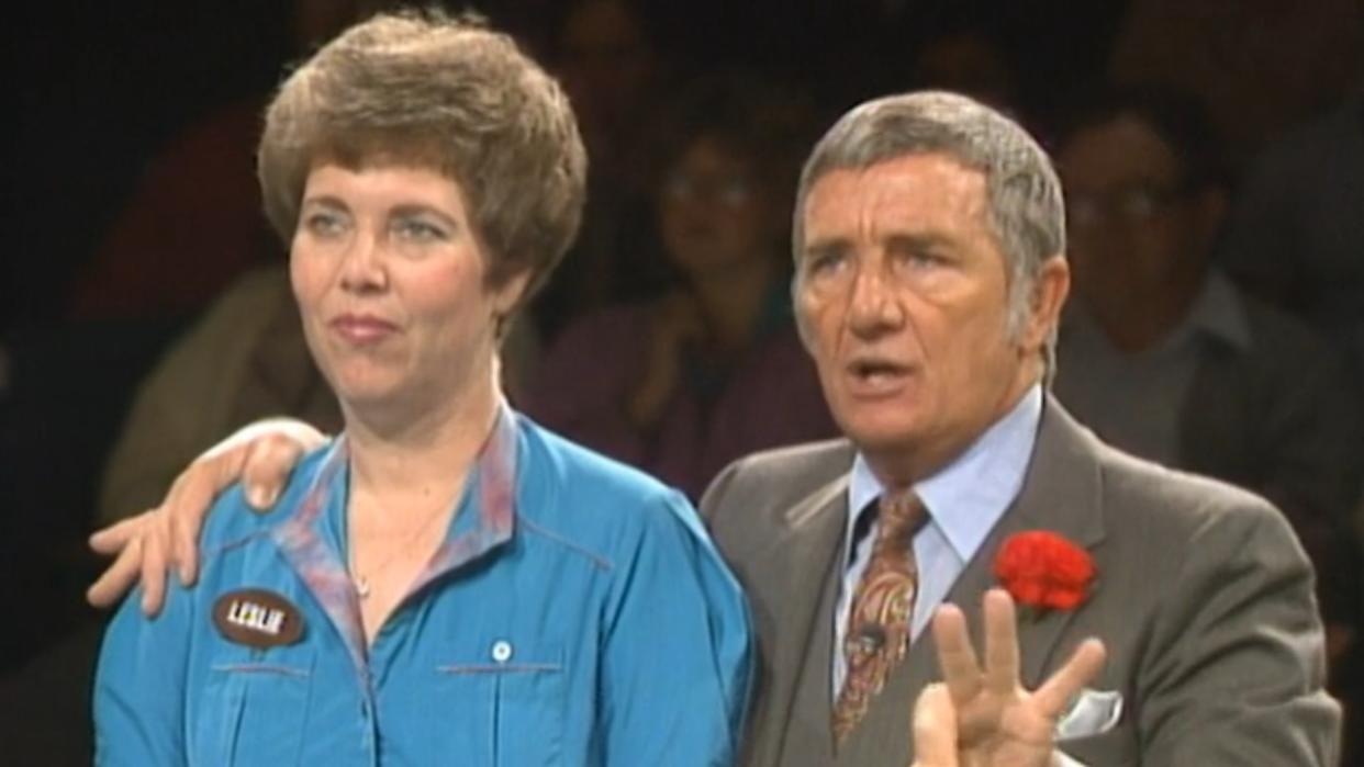  Richard Dawson and female contestant during Family Feud Fast Money Round. 