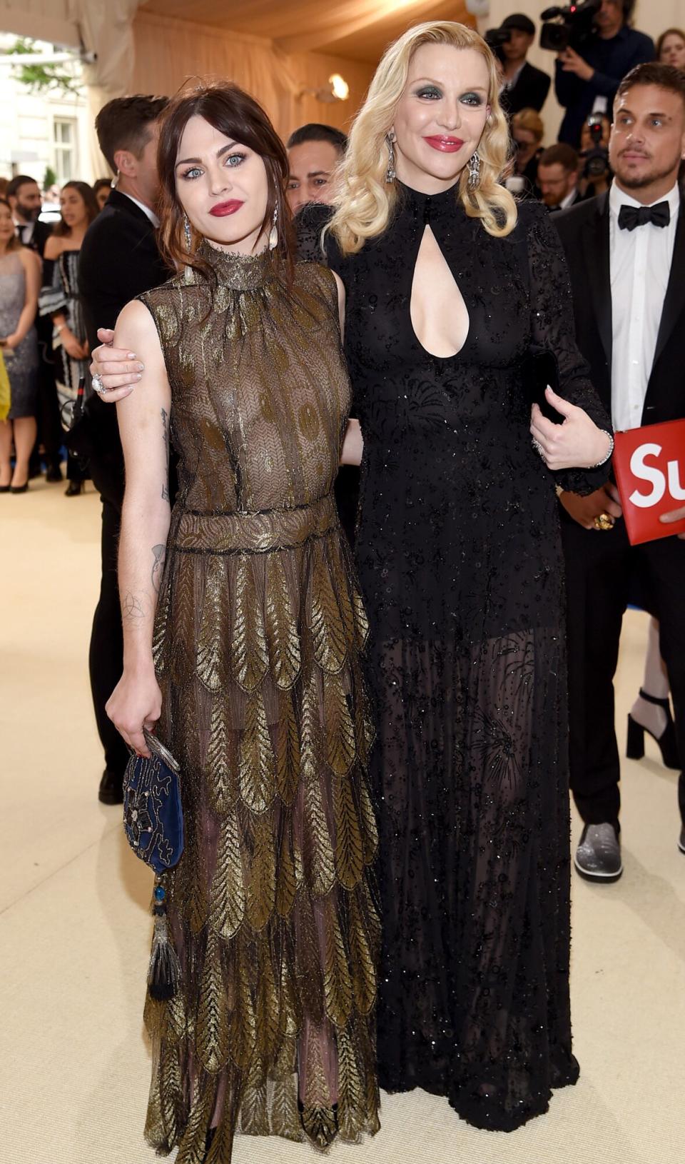 Frances Bean Cobain (L) and Courtney Love attend the "Rei Kawakubo/Comme des Garcons: Art Of The In-Between" Costume Institute Gala at Metropolitan Museum of Art on May 1, 2017 in New York City