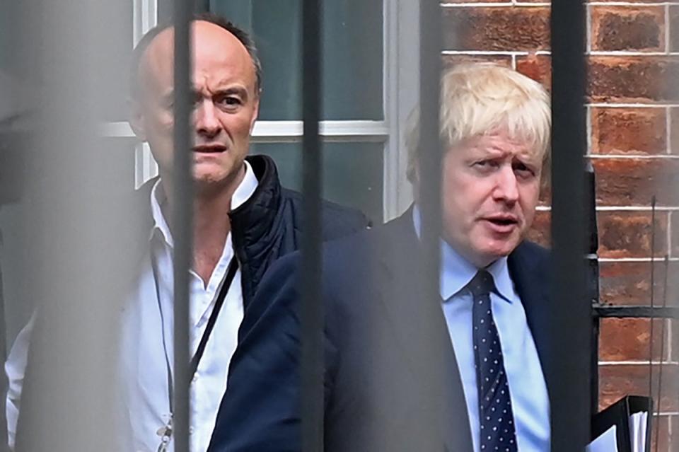 Dominic Cummings and Boris Johnson leave Downing Steet for the House of Parliament on 3 September 2019 (AFP/Getty)