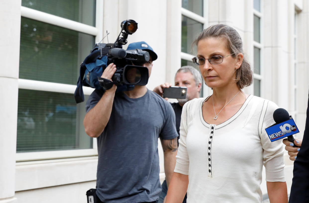 Clare Bronfman was remanded into custody after she was sentenced to nearly seven years in prison. 