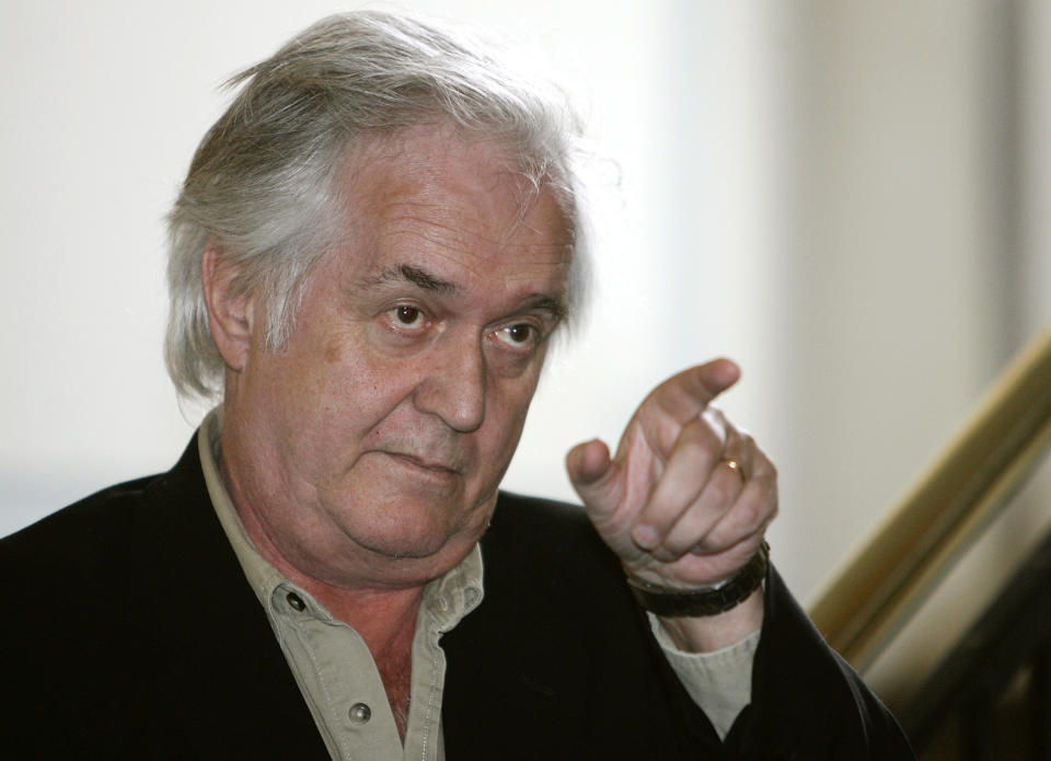 FILE - In this Tuesday, April 11, 2006 file photo, Swedish crime writer Henning Mankell gestures during a photocall in Hamburg, northern Germany. Mankell wrote on his website Wednesday, Jan. 29, 2014 that he received “a serious diagnosis of cancer” after going to a hospital to check out a hernia in the neck. Mankell is best known for his mystery novels featuring the gloomy inspector Kurt Wallander. (AP Photo/Fabian Bimmer, File)