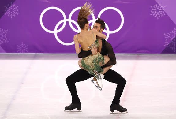 Papadakis and Cizeron perform their short dance program on Monday in Pyeongchang, South Korea. Early in the performance, Papadakis experienced an unexpected setback when a clasp on her costume came undone.