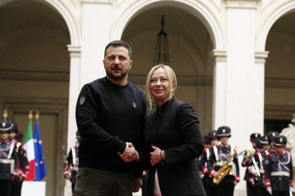 Italian Premier Giorgia Meloni, right, and Ukrainian President Volodymyr Zelenskyy shake hands before their meeting at Chigi Palace, Government's office, in Rome, Saturday, May 13, 2023. Zelenskyy is in Italy for a one-day visit and will meet with Pope Francis at The Vatican. (AP Photo/Alessandra Tarantino)