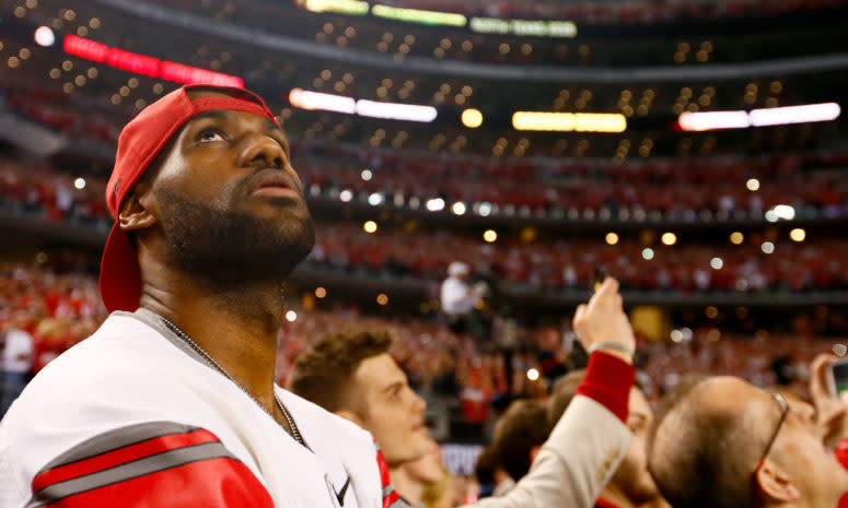 LeBron James roots on Ohio State in the championship game.