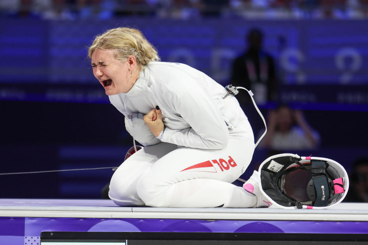 Poland's Aleksandra Jarecka celebrates her victory after the women's team Epee bronze final match against China at Paris 2024 Olympic Games at the Grand Palaison on 30 July 2024 in Nanterre, France. 