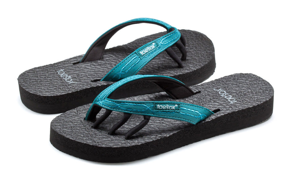 <p>Toesox sandals are great, as they have the slips between the digits which allow for better grip to the sandal and also support the individual digits during walking. I often recommend these sandals to my patients who have hammertoes as they help to support the smaller muscles of the foot. <em><a rel="nofollow noopener" href="http://www.dremilysplichal.com/" target="_blank" data-ylk="slk:Emily Spichal,;elm:context_link;itc:0;sec:content-canvas" class="link ">Emily Spichal,</a> a podiatrist and fitness trainer based in New York City </em></p><p>To buy: $45; <a rel="nofollow noopener" href="https://www.amazon.com/Toesox-Womens-Serena-Flat-Berry/dp/B00JRCXV80?ie=UTF8&linkCode=as2&ref_=as_at&tag=healthcom04a-20" target="_blank" data-ylk="slk:amazon.com;elm:context_link;itc:0;sec:content-canvas" class="link ">amazon.com</a></p>