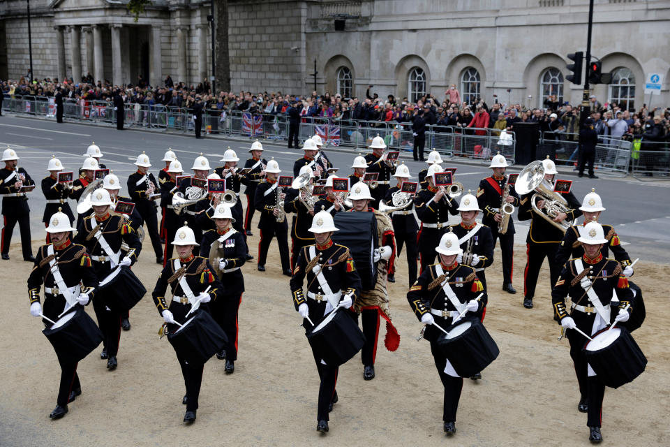 Members of a military marching band walk ahead of the State Funeral of Queen Elizabeth II, held at Westminster Abbey, London. Picture date: Monday September 19, 2022.