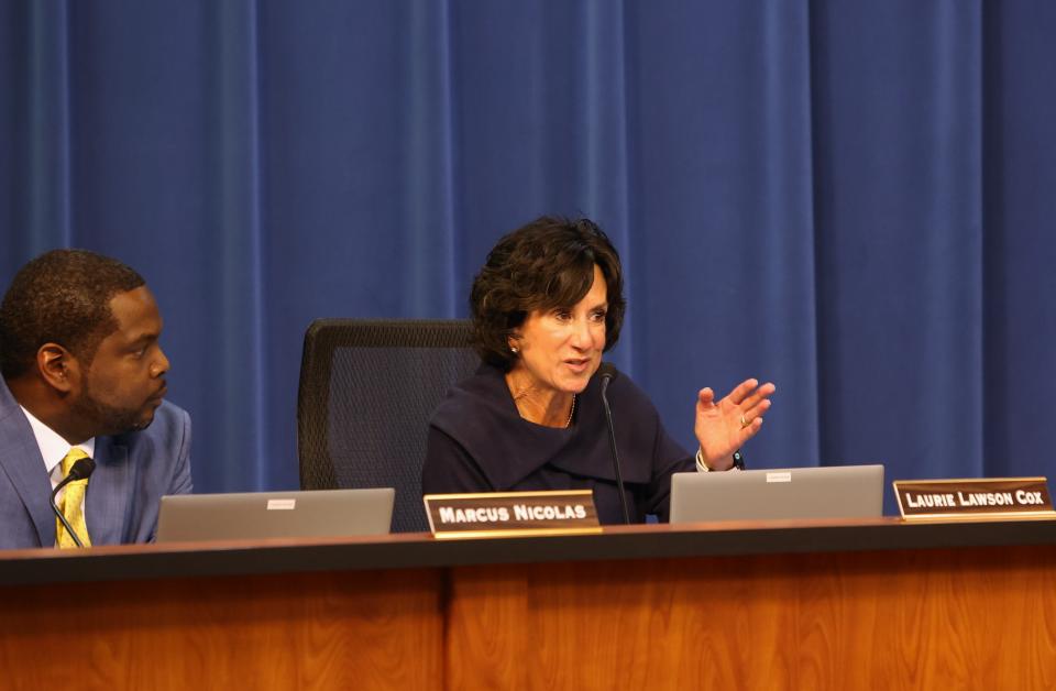 Laurie Cox, right, at a Leon County School Board meeting on Tuesday, Nov. 22, 2022.