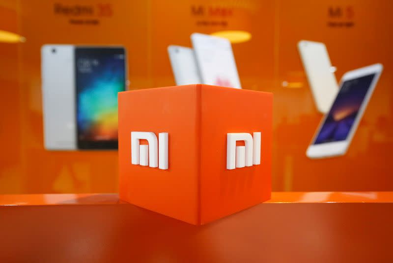 FILE PHOTO: FILE PHOTO: The logo of Xiaomi is seen inside the company's office in Bengaluru