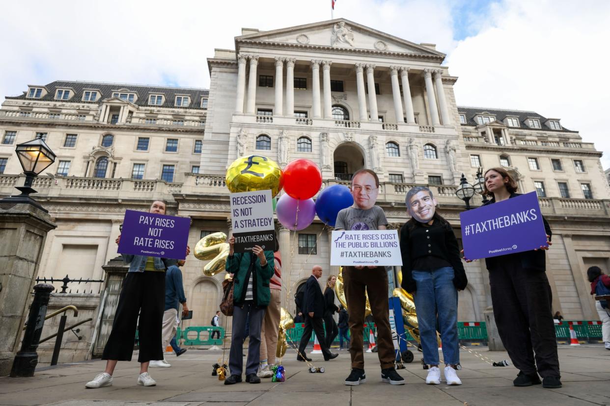 Demonstrators protest against the Bank of England' approach to fighting inflation outside its headquarters in the City of London on Aug. 3, 2023. (Photo: Bloomberg)