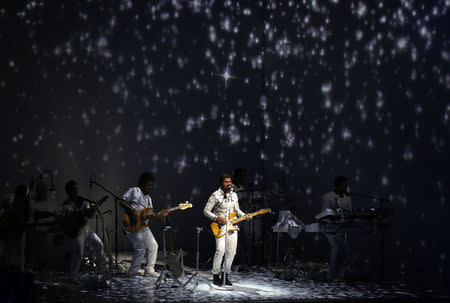 Juanes performs a medley of songs. REUTERS/Mike Blake