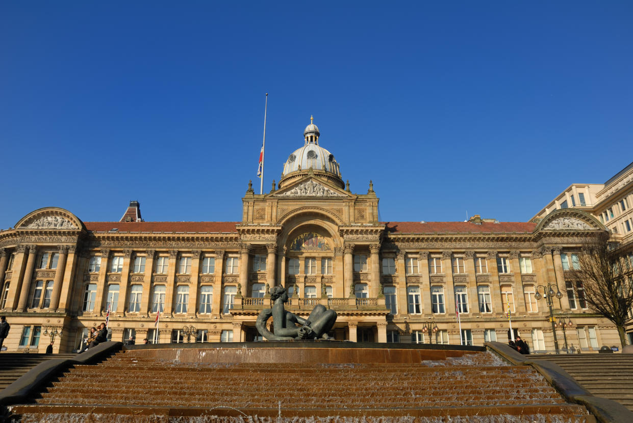 A wide angle view of the city hall in Victoria Square Birmingham.