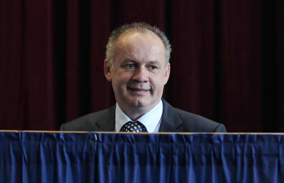 Presidential candidate, businessman and philanthropist Andrej Kiska prepares to cast his ballot in the second round of the presidential elections in Poprad, Slovakia, Saturday, March 29, 2014. Kiska´s rival is Slovak Prime Minister Robert Fico. (AP Photo,CTK/Alexander Supik) SLOVAKIA OUT