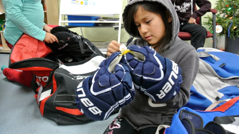 They didn't win — but they don't mind: Girls from remote First Nation play in 1st hockey tournament