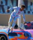 <p>Jaden Smith brightens up L.A. on Friday in his colorful ensemble and car while reportedly shooting a music video.</p>