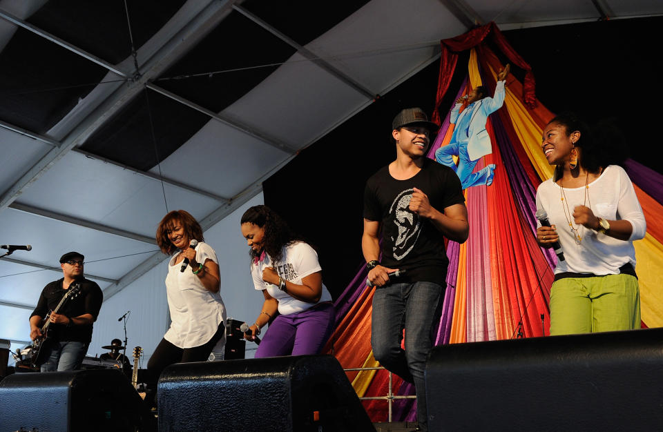 NEW ORLEANS, LA - APRIL 28: Israel Houghton (left) and New Breed performs during the 2012 New Orleans Jazz & Heritage Festival Day 2 at the Fair Grounds Race Course on April 28, 2012 in New Orleans, Louisiana. (Photo by Rick Diamond/Getty Images)