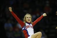 Dayton cheerleaders perform during the first half in a regional semifinal game against Stanford at the NCAA college basketball tournament, Thursday, March 27, 2014, in Memphis, Tenn. (AP Photo/John Bazemore)