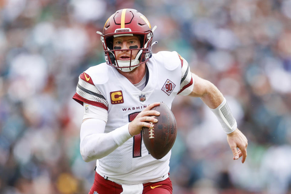 Washington Commanders quarterback Carson Wentz (11) looks to make a pass during the second half of a NFL football game between the Washington Commanders and the Philadelphia Eagles on Sunday, Sept. 25, 2022 at FedExField in Landover, Md. (Shaban Athuman/Richmond Times-Dispatch via AP)