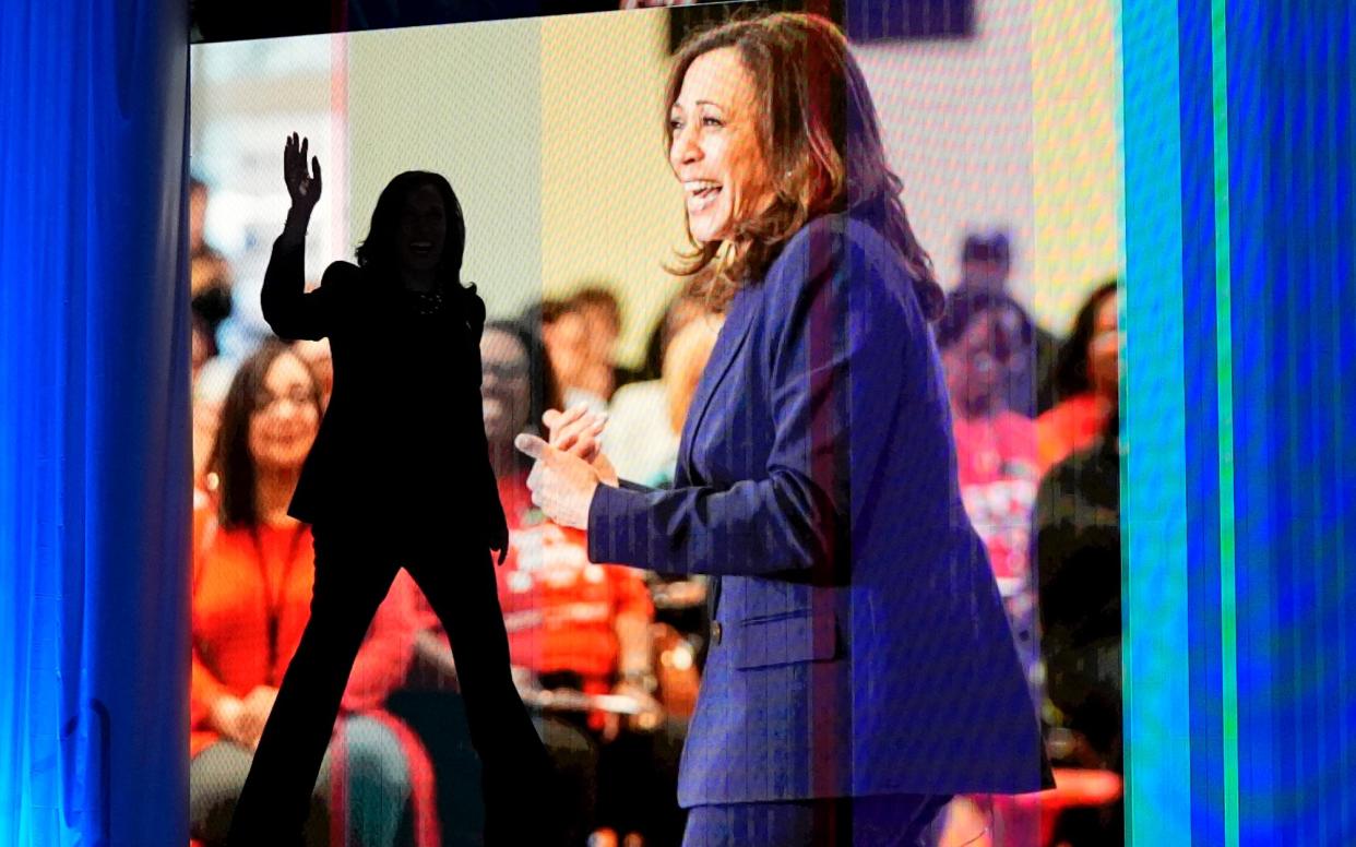 Ms Harris, pictured arriving on stage for a speech in Texas on Thursday, was accused by Republicans of 'inaction'