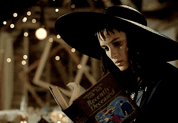 Lydia from "Beetlejuice" reading a book