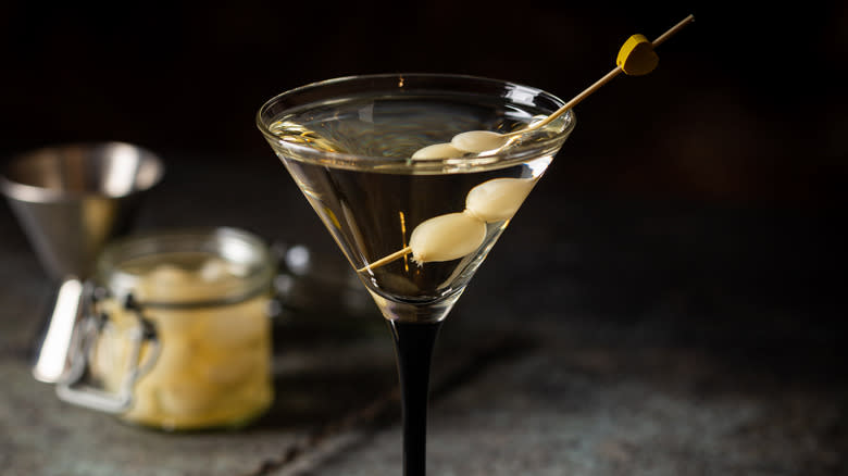 Martini with skewer of olives