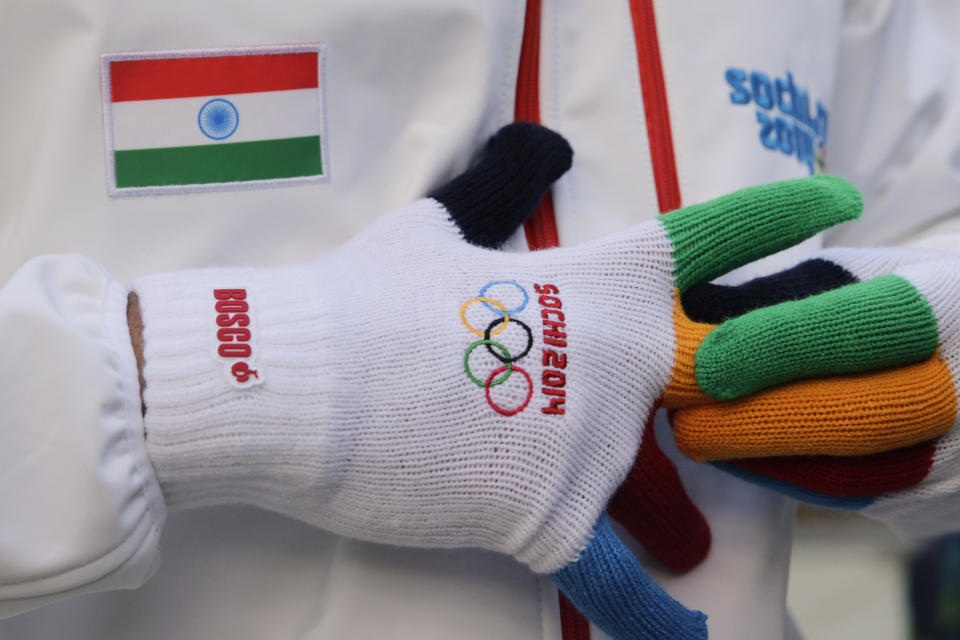 Indian luger Shiva Keshavan talks to reporters after a welcome ceremony for the Indian Olympic team at the Mountain Olympic Village at the 2014 Winter Olympics, Sunday, Feb. 16, 2014, in Krasnaya Polyana, Russia. (AP Photo/Jae C. Hong)