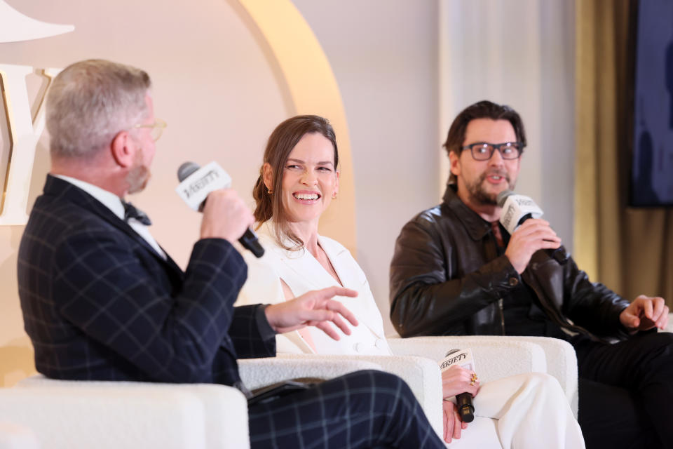 LOS ANGELES, CALIFORNIA - FEBRUARY 13: Marc Malkin, Senior Culture & Events Editor at Variety, Hilary Swank, and Jon Gunn speak onstage during the Variety Spirituality and Faith in Entertainment Breakfast presented by FAMI at The London Hotel on February 13, 2024 in Los Angeles, California. (Photo by Rodin Eckenroth/Variety via Getty Images)