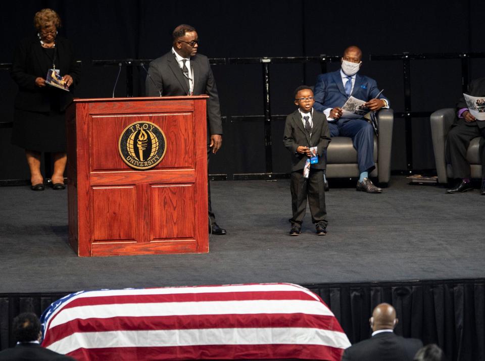 Jaxon Lewis Brewster speaks during the memorial services for his Great Uncle Congressman John Lewis at Trojan Arena in Troy, Ala., on Saturday, July 25, 2020.