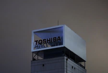 The logo of Toshiba Corp is pictured at its headquarters in Tokyo, Japan, August 31, 2015. REUTERS/Yuya Shino/File Photo - RTX2WSNY