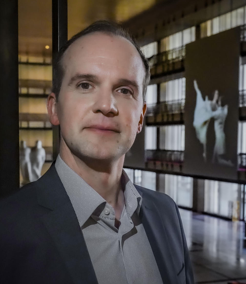 New York City Ballet's artistic director Jonathan Stafford poses inside the lobby of the David H. Koch Theater at Lincoln Center, Thursday, Feb. 29, 2024, in New York. (AP Photo/Bebeto Matthews)