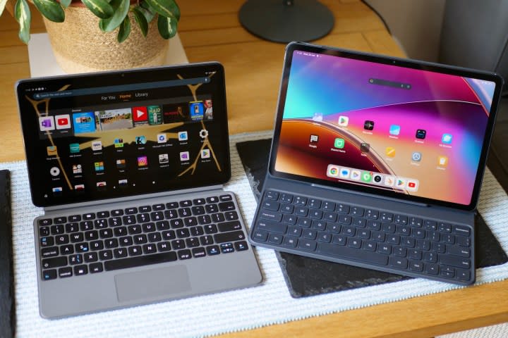 The Amazon Fire Max 11 and Poco Pad in their keyboard cases.