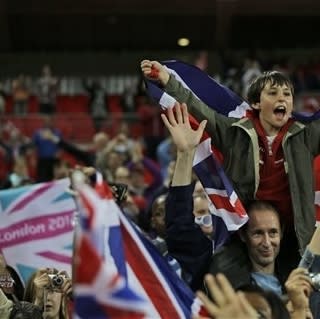 Great Britain's fans celebrate their team's victory against Brazil following their preliminary round Group E group women's soccer match at Wembley Stadium, during the London 2012 Summer Olympics, in London, Tuesday, July 31, 2012. Great Britain won the match 1-0. (AP Photo/Lefteris Pitarakis)