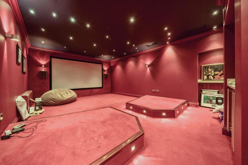 The £2.75 million mansion has its own home cinema room (Landwood Property Auctions)