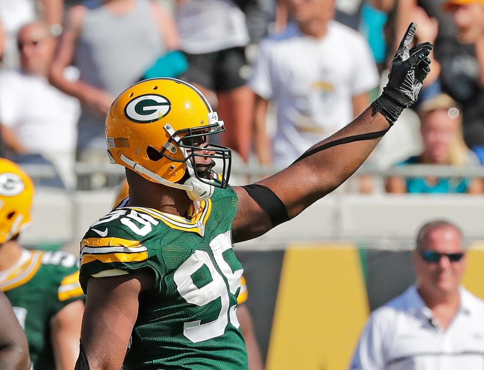 Green Bay Packers defensive end Datone Jones celebrates the fourth-down stop that clinched the game against Jacksonville.