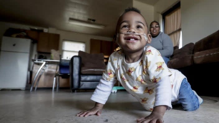 Curtis Means crawls around as his mother, Michelle Butler, keeps an eye on him at their home in Eutaw, Alabama. Growing numbers of extremely premature infants, like Curtis, are getting life-saving treatment and surviving. (Photo: Butch Dill/AP)