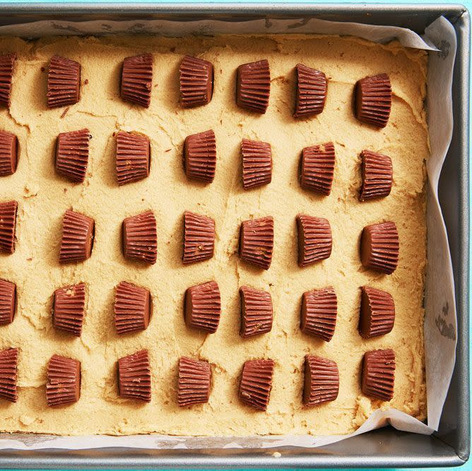 <p>We have a real soft spot for our <a href="https://www.delish.com/cooking/recipe-ideas/recipes/a51808/reeses-stuffed-brownies-recipe/" rel="nofollow noopener" target="_blank" data-ylk="slk:Reese's Stuffed Brownies;elm:context_link;itc:0;sec:content-canvas" class="link ">Reese's Stuffed Brownies</a>, but when we're craving a cookie and peanut butter (and chocolate), these blondies are the solution. If you love this recipe, you'll go CRAZY for our <a href="https://www.delish.com/uk/cooking/recipes/a29577647/battenberg-brownies/" rel="nofollow noopener" target="_blank" data-ylk="slk:Battenberg Brownies;elm:context_link;itc:0;sec:content-canvas" class="link ">Battenberg Brownies</a>.</p><p>Get the <a href="https://www.delish.com/uk/cooking/recipes/a30713621/reeses-peanut-butter-blondies-recipe/" rel="nofollow noopener" target="_blank" data-ylk="slk:Reese's Peanut Butter Blondies;elm:context_link;itc:0;sec:content-canvas" class="link ">Reese's Peanut Butter Blondies</a> recipe. </p>