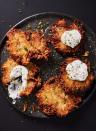 <p>Though <a href="https://www.delish.com/holiday-recipes/hanukkah/a34772139/hanukkah-latkes/" rel="nofollow noopener" target="_blank" data-ylk="slk:latkes;elm:context_link;itc:0;sec:content-canvas" class="link ">latkes</a> are commonly served with <a href="https://www.delish.com/cooking/recipe-ideas/a28848550/instant-pot-applesauce-recipe/" rel="nofollow noopener" target="_blank" data-ylk="slk:applesauce;elm:context_link;itc:0;sec:content-canvas" class="link ">applesauce</a> and plain sour cream, here, they get a flavor-boost with a spicy horseradish and chive sour cream topping, which adds savory depth to each bite.</p><p>Get the <strong><a href="http://www.delish.com/cooking/recipe-ideas/a39493185/house-latkes-with-horseradish-recipe/" rel="nofollow noopener" target="_blank" data-ylk="slk:House Latkes With Horseradish recipe;elm:context_link;itc:0;sec:content-canvas" class="link ">House Latkes With Horseradish recipe</a></strong>.</p>