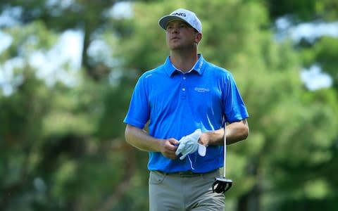 Nate Lashley walks on the fourth fairway after his second shot during The Open Qualifying Series, part of the Rocket Mortgage Classic at Detroit Golf Club  - Credit: GETTY IMAGES