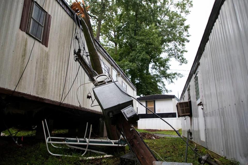 Severe thunderstorms brought damaging winds, power outages, downed trees, potential for hail, tornadoes to Charlotte NC Monday, Aug. 7, 2023. FAA grounded CLT planes. A downed tree is seen at Shady Grove Mobile Home Park in Charlotte.