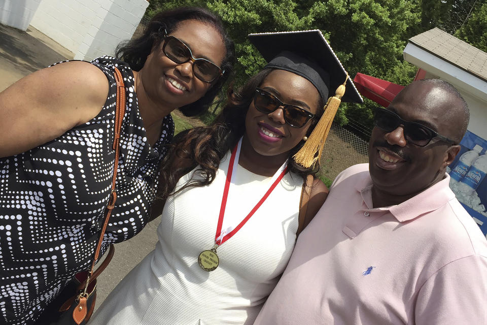 Cynthia Graham-Hurd, left, who was killed in the June 17, 2015, shooting at Mother Emanuel AME Church in Charleston, S.C., poses for a picture with her niece, Cortney Graham, and her younger brother, former North Carolina state Sen. Malcolm Graham. The photo was taken a month before Graham-Hurd's death. (Courtesy of Malcolm Graham via AP)