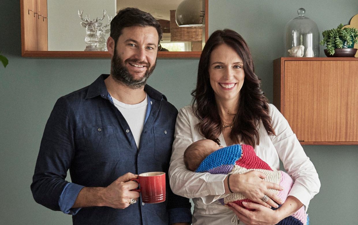 New Zealand Prime Minister Jacinda Ardern, right, poses for a family portrait with partner Clarke Gayford and their baby daughter Neve in 2018 - Derek Henderson 